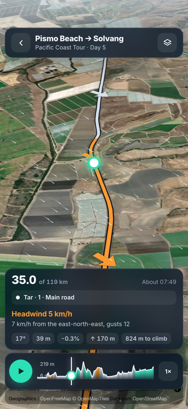 Fly the route on a phone: a headwind stretch coloured orange, with the wind, the road and the climb at that point